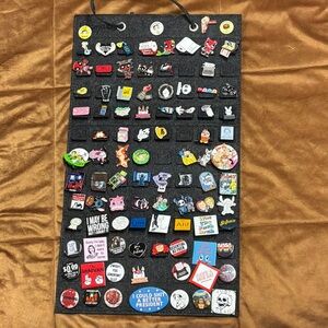 Colorful Pin Collection on Display Board